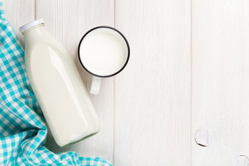 Milk cup and bottle © evgeeenius