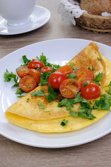 Omelet with tomatoes and herbs