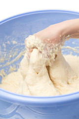 Making dough by female hands