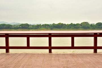 Railing situated along the Mae Khong River in the park  