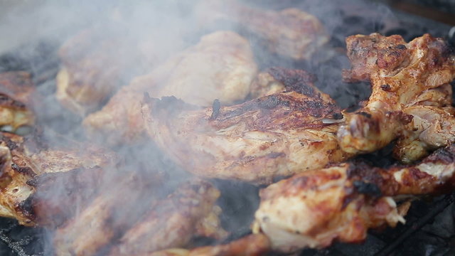 Chicken meat on barbeque grill