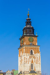 Fototapeta na wymiar Old Town Hall at Main Market Square in Krakow, Poland, Europe