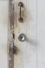 Door knobs and locks were closed on white background.