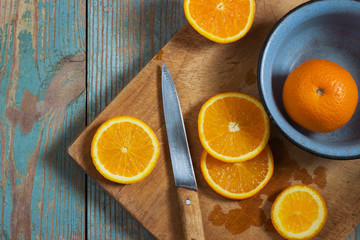 Oranges isolated cut set on wooden base
