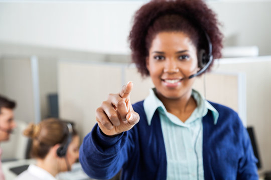 Customer Service Agent Pointing At You In Call Center - Powered by Adobe