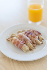 Japanese cuisine, bacon and Enoki Mushroom roll