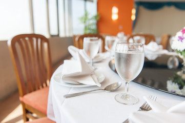 Shot with a dinner table in a restaurant.