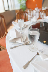 Shot with a dinner table in a restaurant.