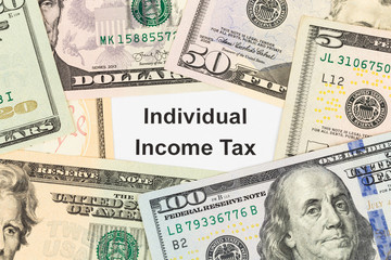 Individual Income Tax and dollar banknote taxation concept