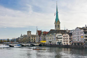 Fototapeta na wymiar Zurich Limmat River and historic architecture