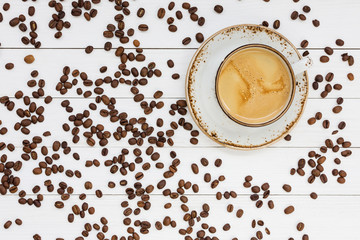 Cup of coffee, coffee background. Top view