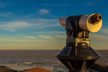 Telescope At The Beach By The Sea At Sunset | Stock image