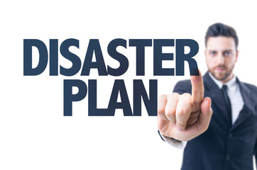 Business man pointing the text: Disaster Plan