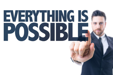 Business man pointing the text: Everything is Possible