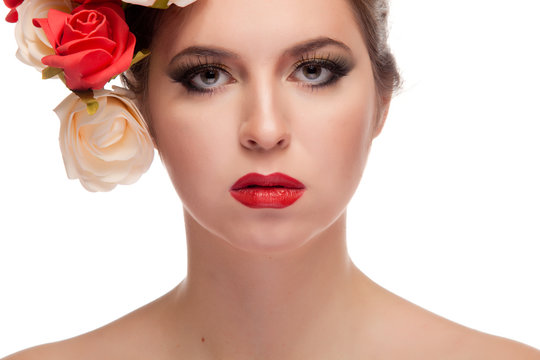 Beauty portrait of girl with flowers in head