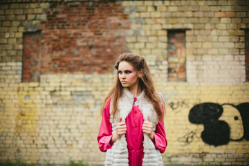 Fashion model in a dress at a photoshoot