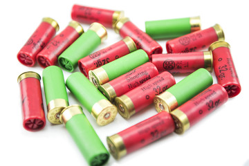 12 gauge shotgun shells isolated on a white background