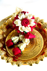 Jasmine garland made from soap on gold tray
