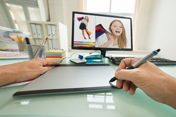 Person Using Graphic Tablet For Sketching
