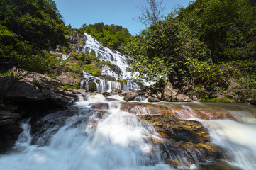 Fototapeta premium Thailand waterfall with the blue sky