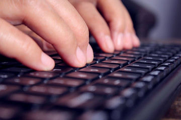 businessman is typing on keyboard