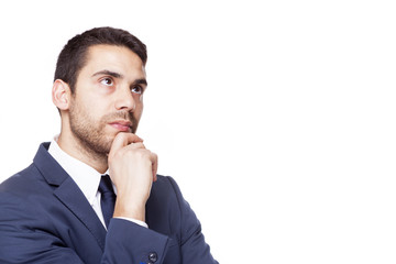 Serious business man thinking, isolated on white background