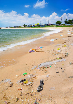 Pollution on the beach of tropical sea.