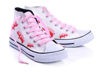 Youth sneakers with printed pigs on a white background - obrazy, fototapety, plakaty