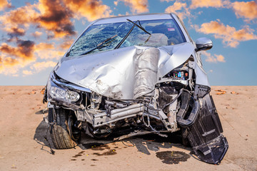 Front of car crash caused by accident after collision in city