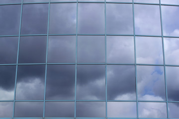 Reflection in glass windows of an office building