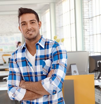 Portrait of casual man at office smiling
