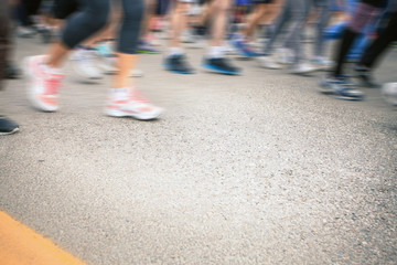 Fototapeta premium marathon of blurred motion crowd people jogging outdoor