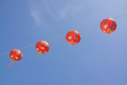 Chinese paper lanterns hanging on the rope