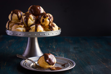  profiteroles with cream and chocolate sauce