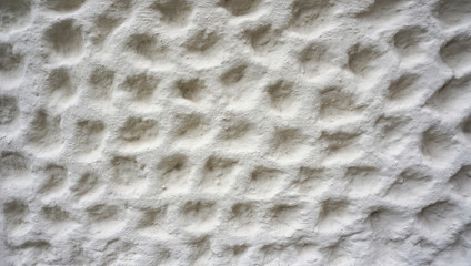 bubble texture on white cement wall finishing
