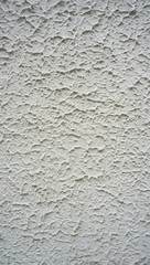 texture on white cement wall finishing vertical