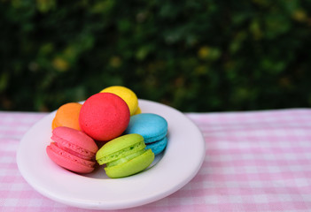colorful mini macarons with love mug