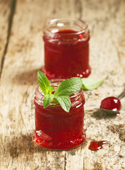 Delicious homemade strawberry jam in a jar, selective focus