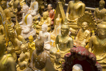 Group of Buddha image in public temple on Songkran Festival