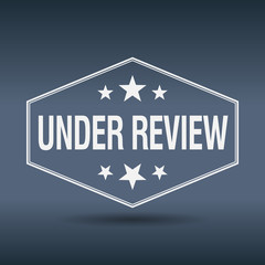 under review hexagonal white vintage retro style label