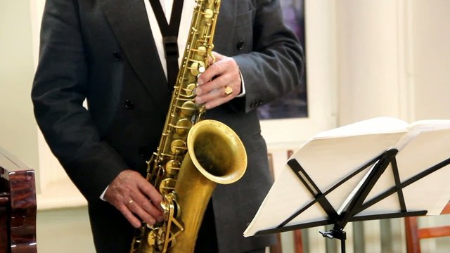 musician playing saxophone