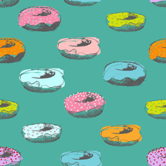 Donut seamless pattern on turquoise 
