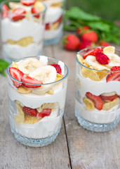 Dessert with strawberries.Cheese, strawberry, banana, cornflakes