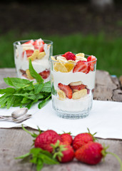 Dessert with strawberries.Cheese, strawberry, banana, cornflakes