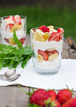 Dessert with strawberries.Cheese, strawberry, banana, cornflakes