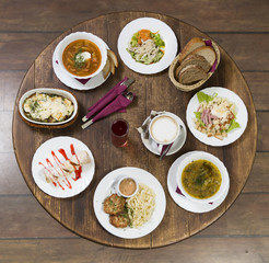Business lunch on a vintage round table.Wednesday