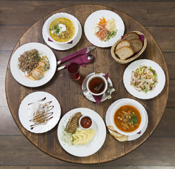 Business lunch on a vintage round table.Thursday