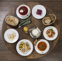 Business lunch on a vintage round table.Friday