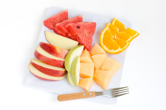 Fresh fruits in plate Apple, Melon,Watermelon,Orange and guava w