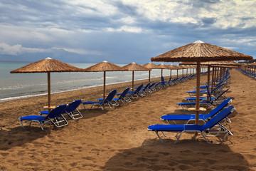 a beach filled with sun beds